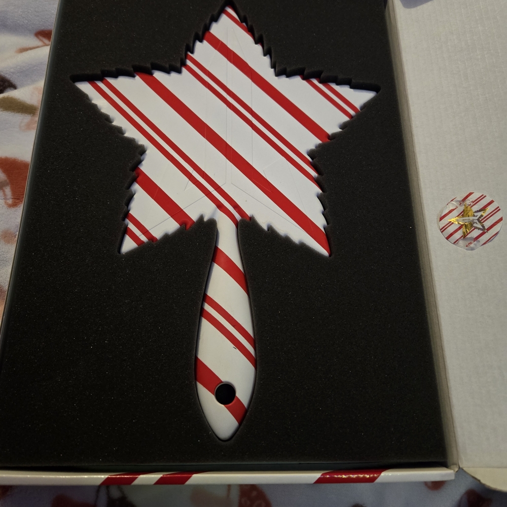 Festive Red and White Striped Holiday Leaf Ornament